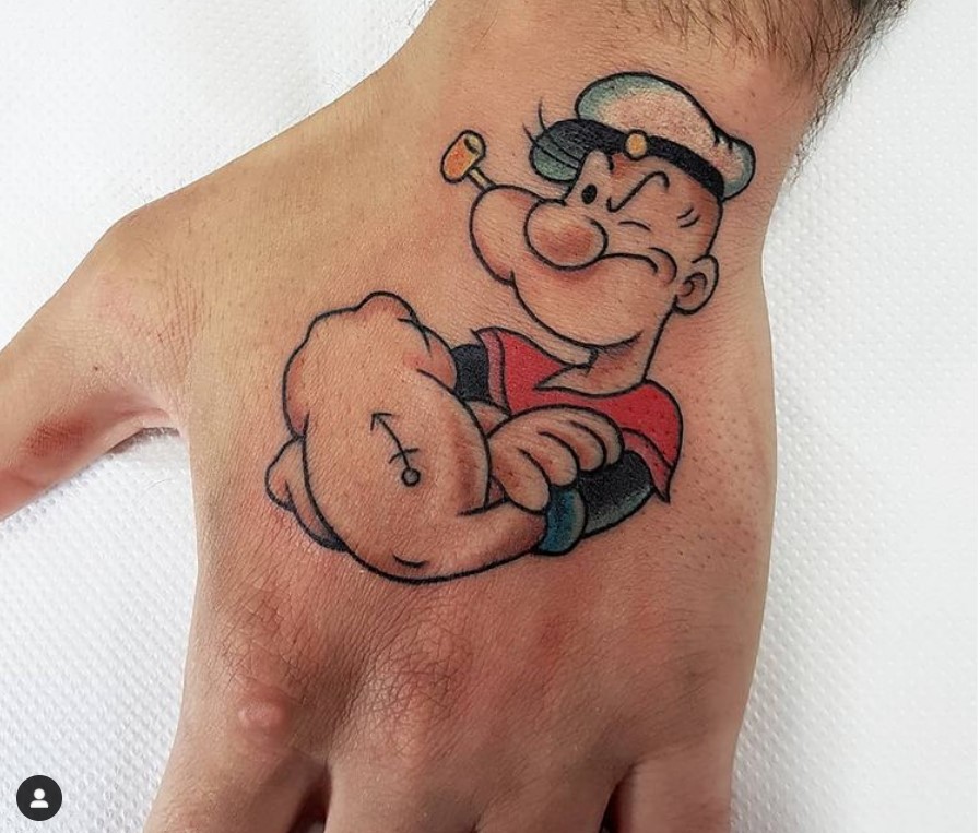 tatuaggio uomo braccio di ferro