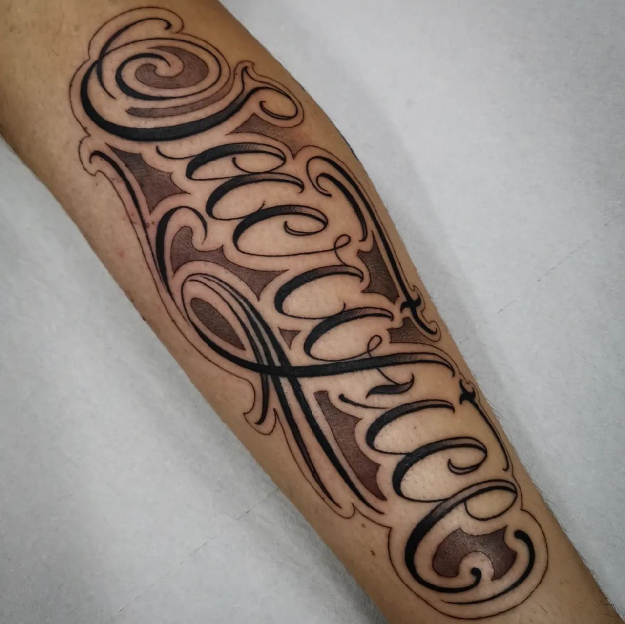 tatuaggio chicano Lettering scritta