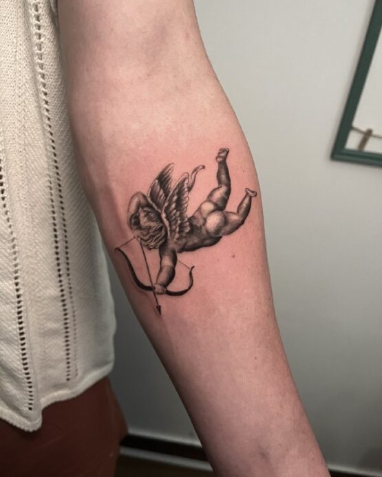 Tatuaggio angioletto Cupido